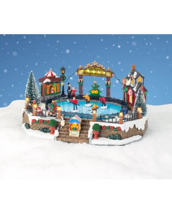 Giostrina Villaggio Natalizio Innevato Con Pista Di Pattinaggio Con Suoni
